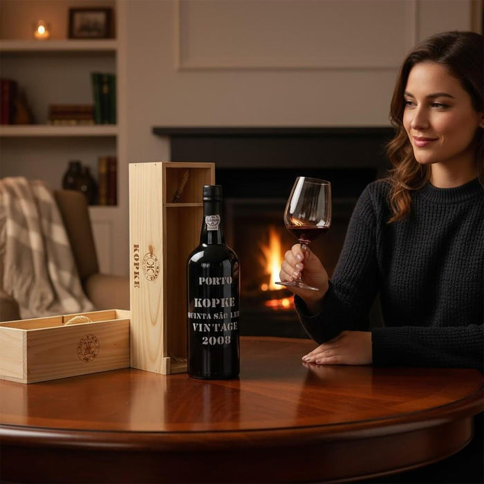 Lady Holding Glass Of Kopke Quinta Sao Luiz Vintage Port 2008