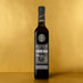 Sandeman Royal Ambrosante Pedro Ximenez 20 Year Old Sherry with a gold backdrop.